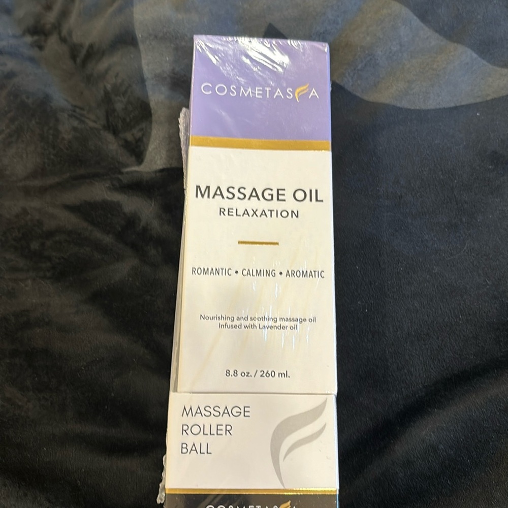Cosmetasa massage oils and roller ball. New in packaging.